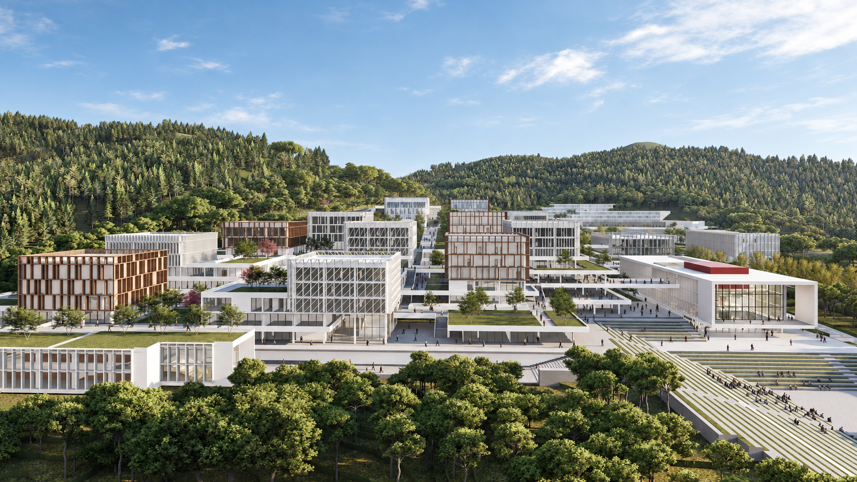 İzmir Ekonomi Üniversitesi Kampüsü, ormanlık yamaçlar önünde kampüs yapıları ve açık alanlar